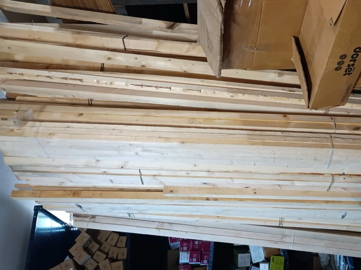 Edges of stacked boards on warehouse racks